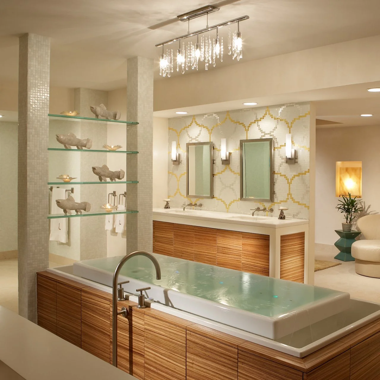 Modern bathroom with built-in soaking tub, glass shelves with fish sculptures, mosaic tile wall, and dual vanity sinks