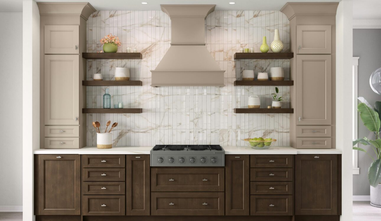 Elegant kitchen with taupe and dark wood two-tone cabinets, marble backsplash, and open floating shelves