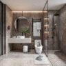 Elegant modern bathroom featuring a walk-in shower, floating vanity with round mirror, and built-in shelving