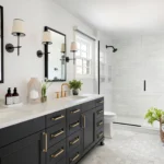 Modern bathroom with black vanity and glass shower enclosure
