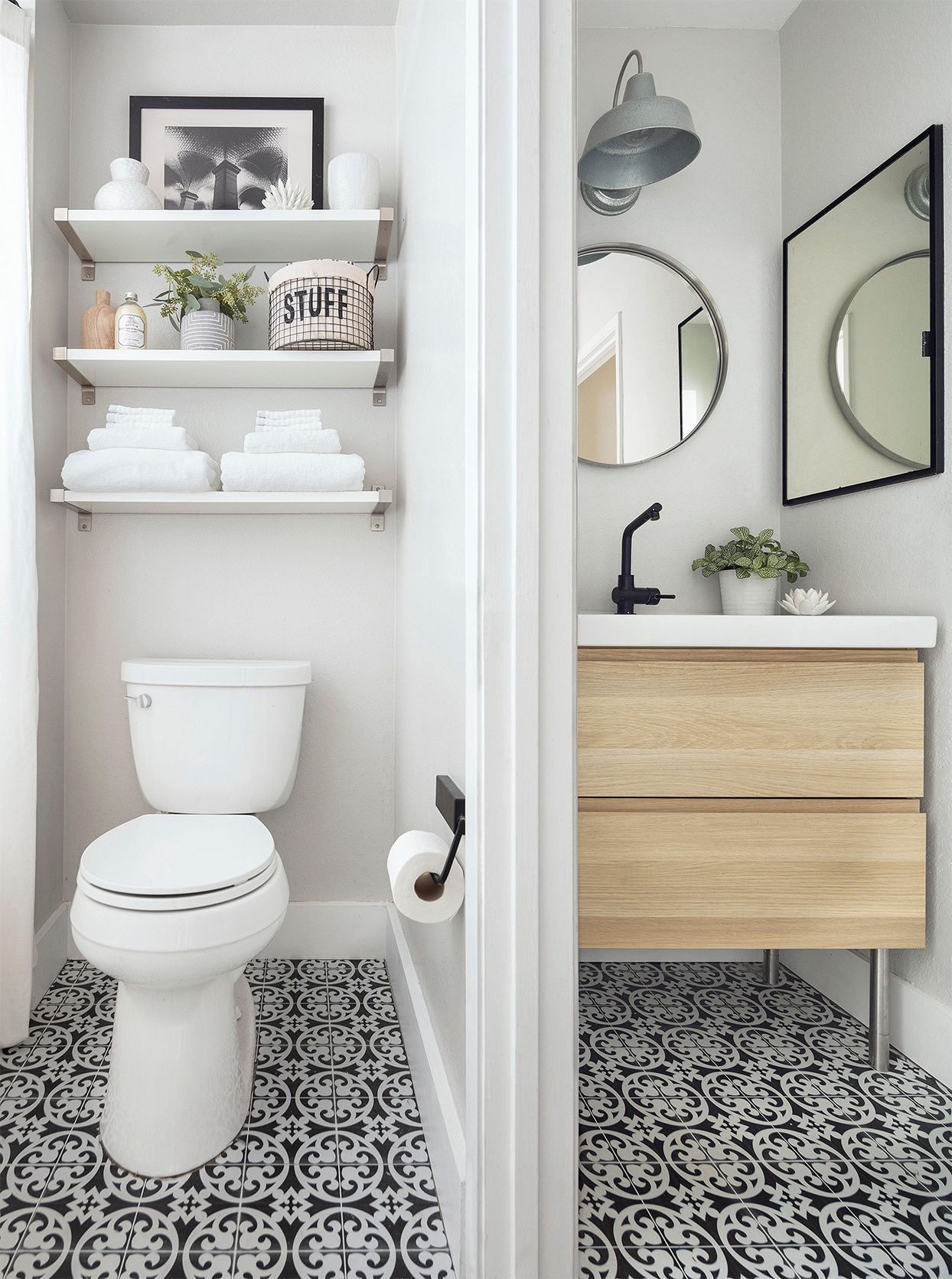 Compact bathroom with open shelving, patterned tile floor, and minimalist vanity.