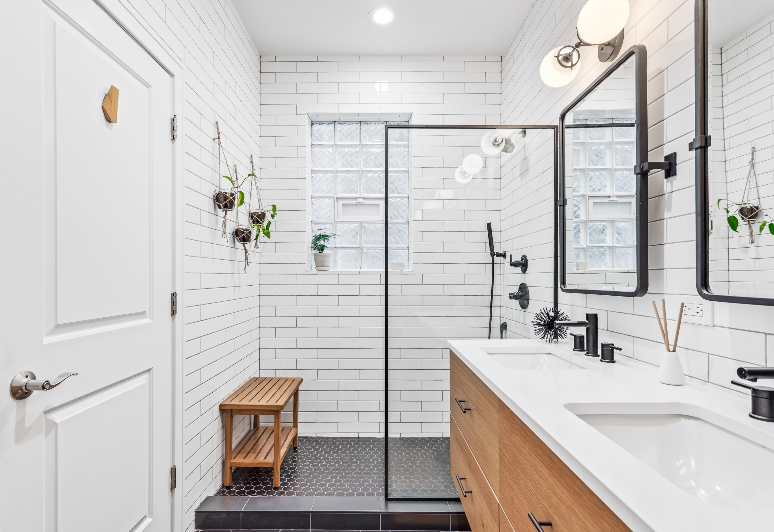 Minimalist bathroom with walk-in shower and wooden vanity